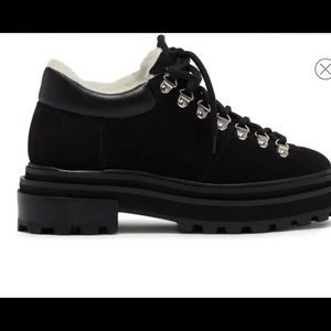 Schutz faux shearling lined boots.